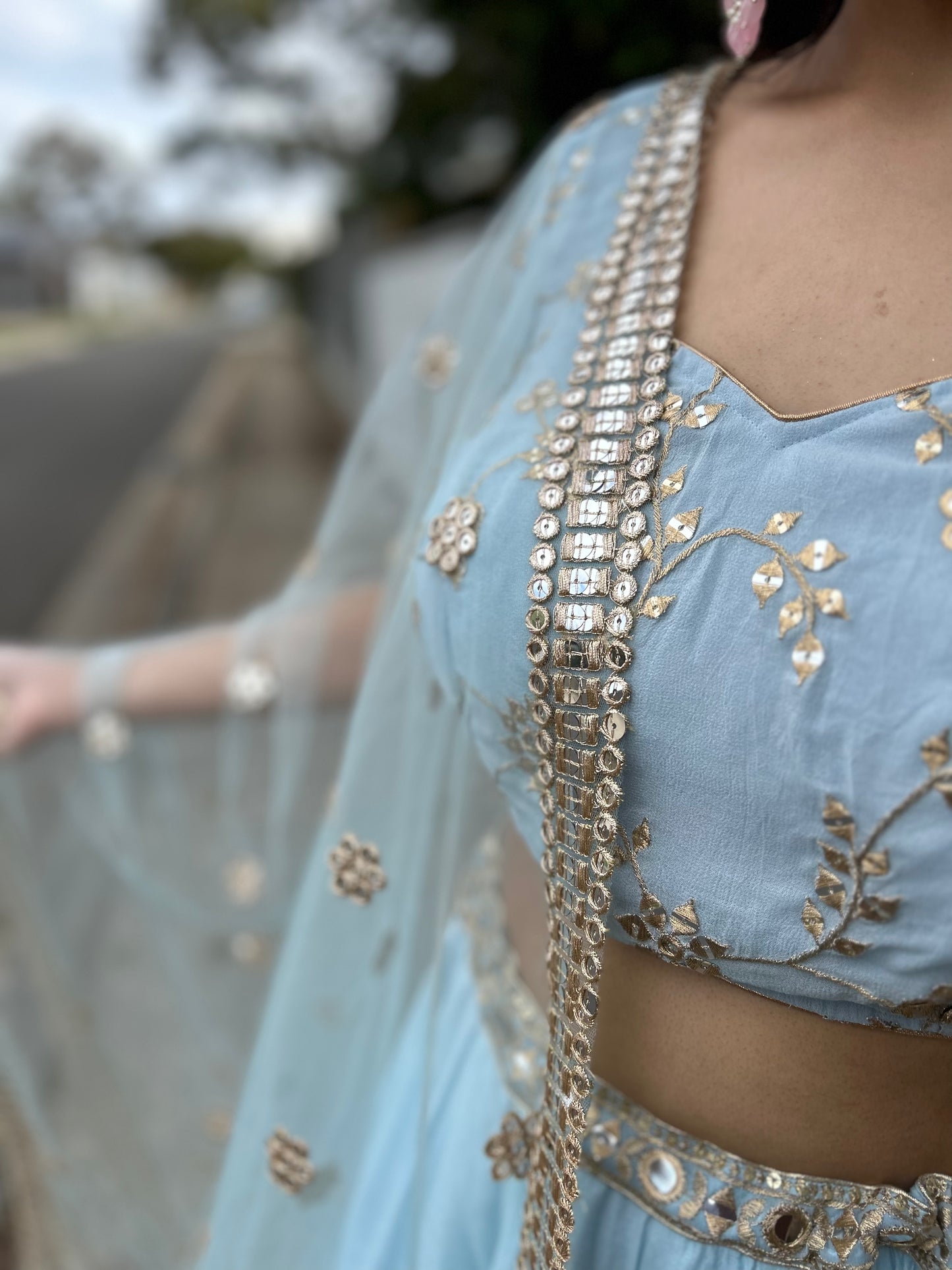 Powder Blue Lehenga with heavy Blouse and Net Dupatta