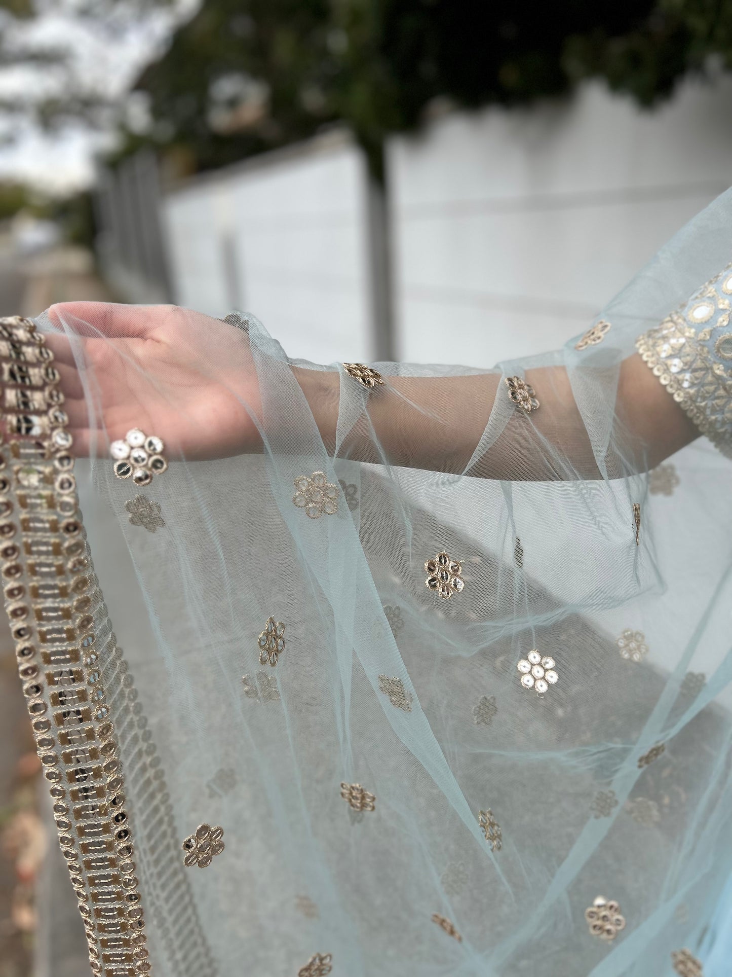 Powder Blue Lehenga with heavy Blouse and Net Dupatta