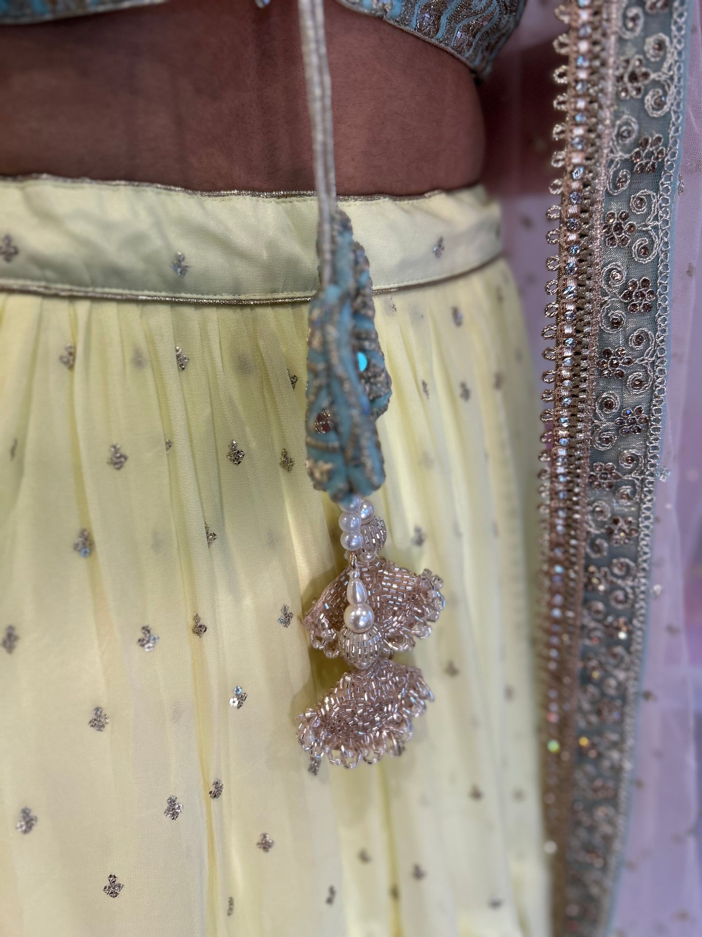 Light Lemon Layered Lehenga with Heavy blouse and Net Dupatta