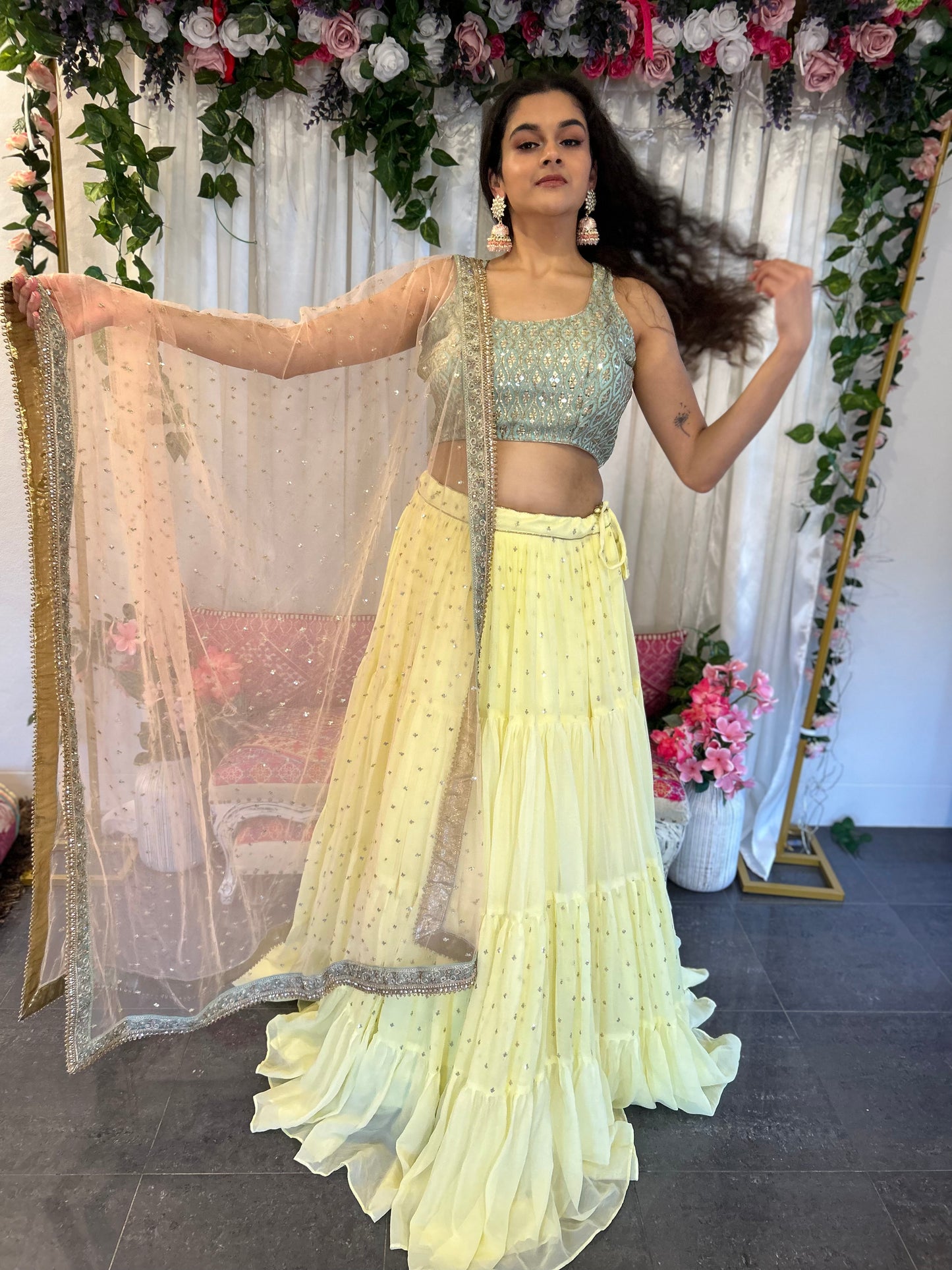 Light Lemon Layered Lehenga with Heavy blouse and Net Dupatta