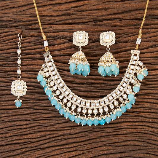 Turquoise Necklace Set with Gold-Tone Finish, Tikka, and Jhumki Earrings