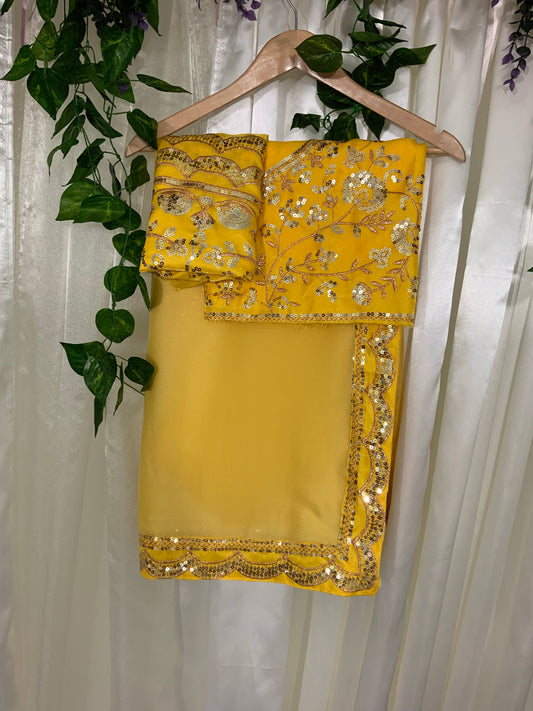 Yellow Georgette Saree with Heavy Embroidered Blouse
